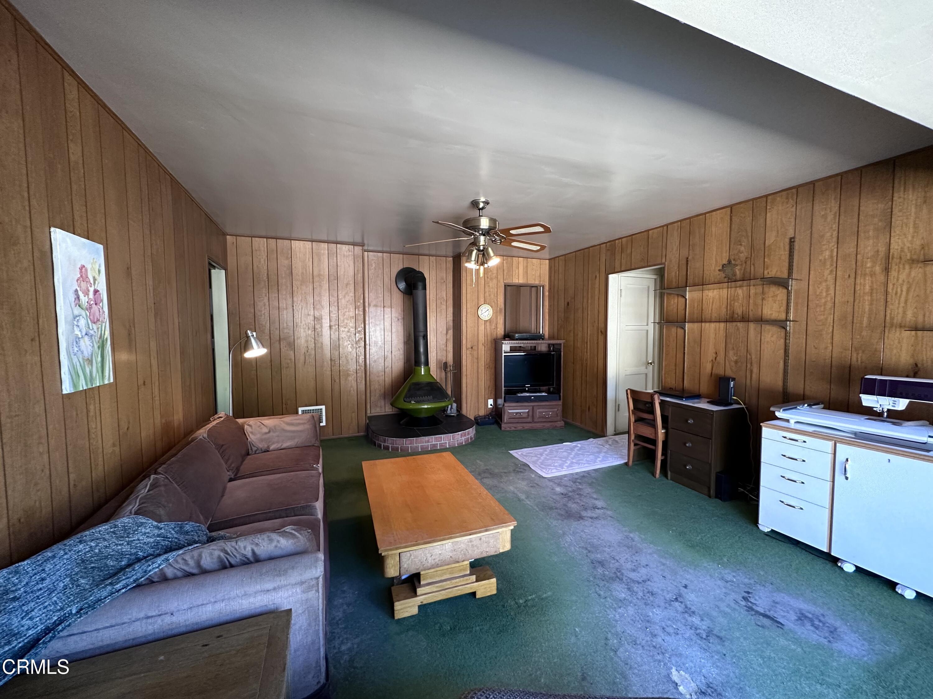 3895 Mayfair Drive Pasadena, CA 91107 - Photo 9 of 18 a living room with furniture and a wooden floor