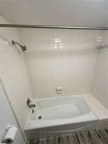 a bathroom with a bathtub