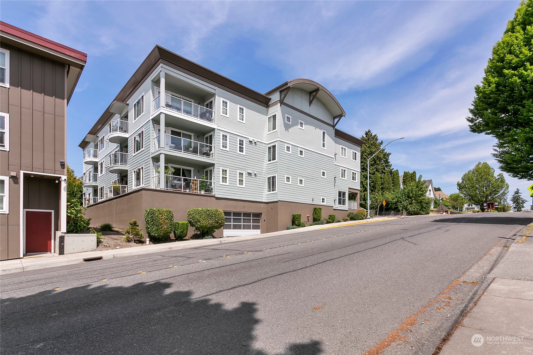 1011 Bancroft Street, Unit 303 Bellingham, WA 98225 - Photo 2 of 40 a front view of a building with a street