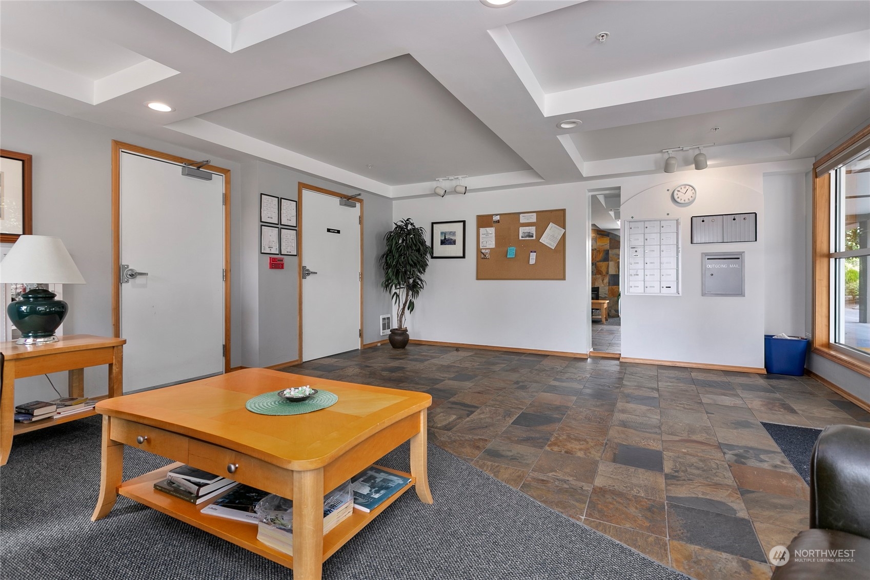 1011 Bancroft Street, Unit 303 Bellingham, WA 98225 - Photo 31 of 40 a room with pool table and paintings on the wall