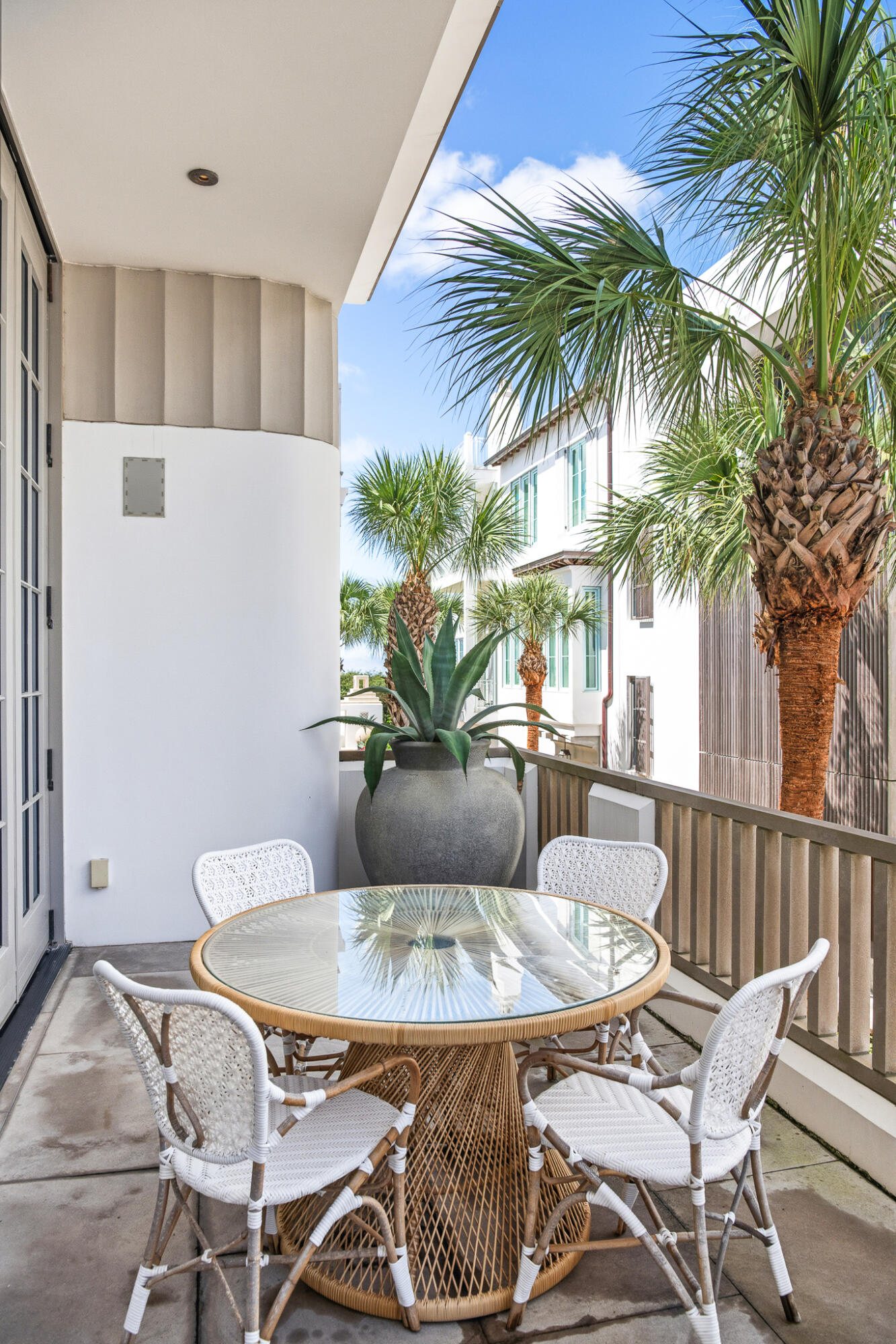 130 Sea Garden Street Inlet Beach, FL 32461 - Photo 41 of 77 a view of a dining room with furniture and a potted plant