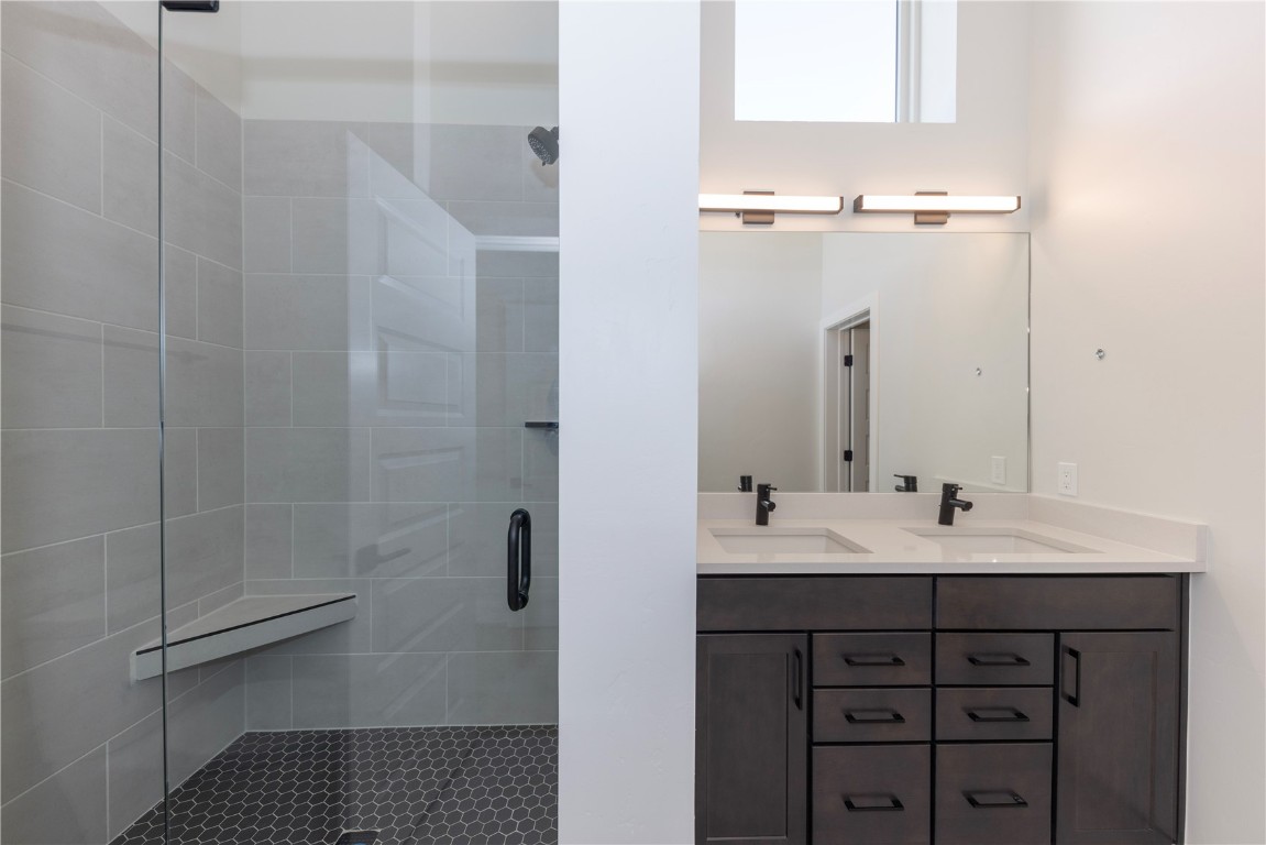 125 West Keystone Road, Unit 301 Keystone, CO 80435 - Photo 22 of 23 a bathroom with a sink and mirror
