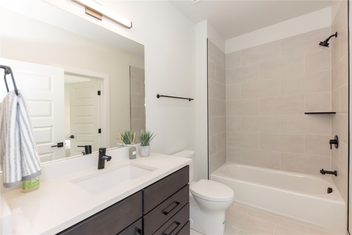 125 West Keystone Road, Unit 301 Keystone, CO 80435 - Photo 23 of 23 a bathroom with a sink a toilet and a large mirror