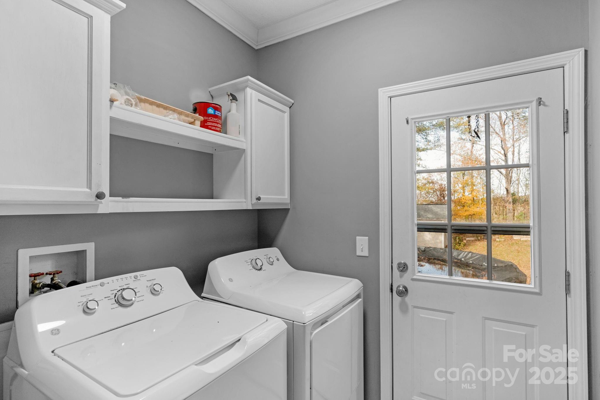 8891 Rock Hole Road Stanfield, NC 28163 - Photo 18 of 35 a utility room with dryer and washer