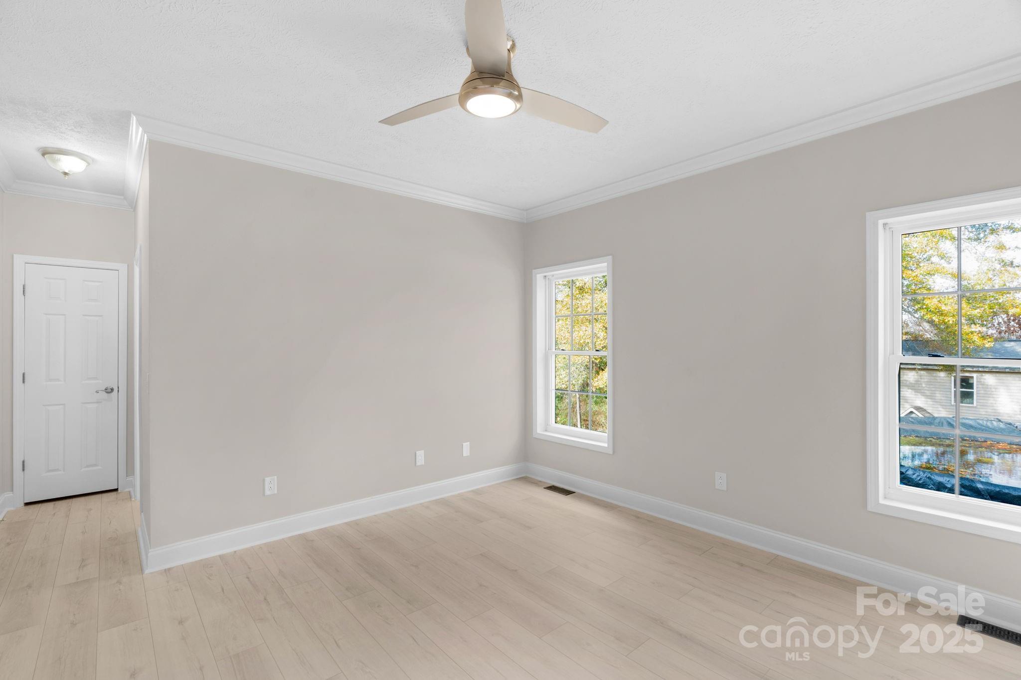 8891 Rock Hole Road Stanfield, NC 28163 - Photo 19 of 35 a view of an empty room with a window