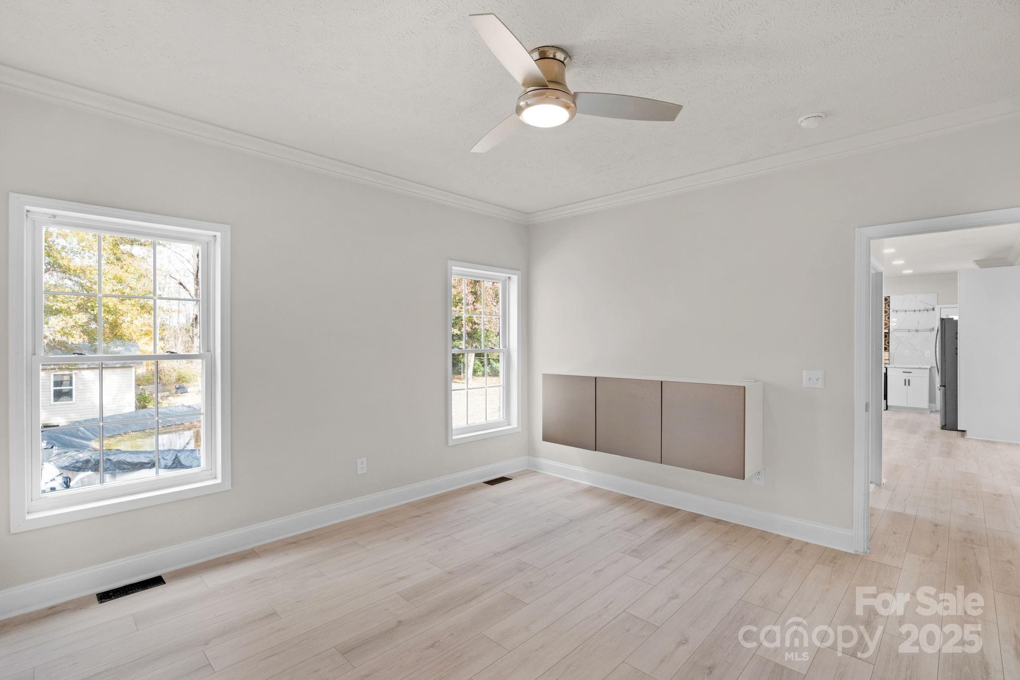 8891 Rock Hole Road Stanfield, NC 28163 - Photo 20 of 35 a view of an empty room with a window