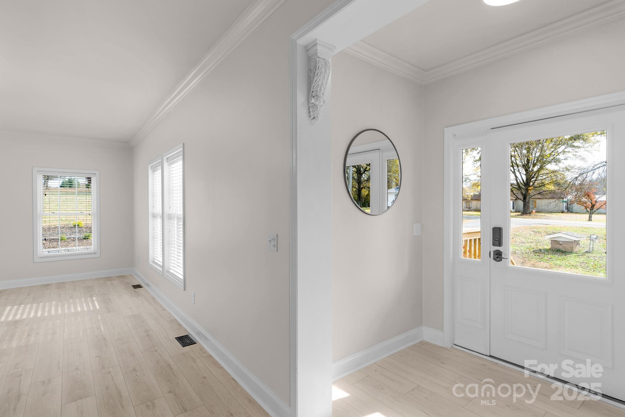 8891 Rock Hole Road Stanfield, NC 28163 - Photo 28 of 35 a view of an entryway with wooden floor