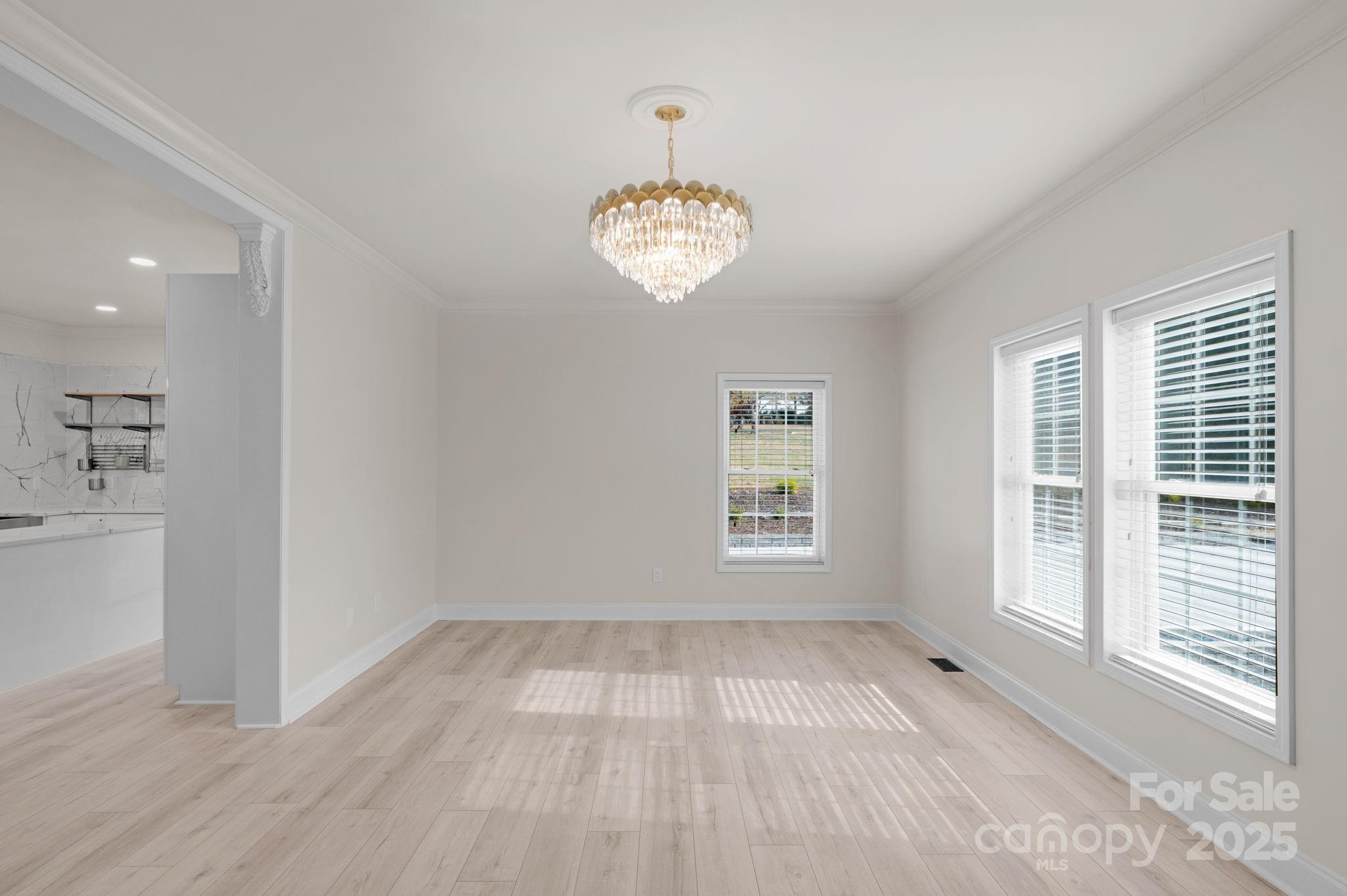 8891 Rock Hole Road Stanfield, NC 28163 - Photo 7 of 35 a view of an empty room with a window