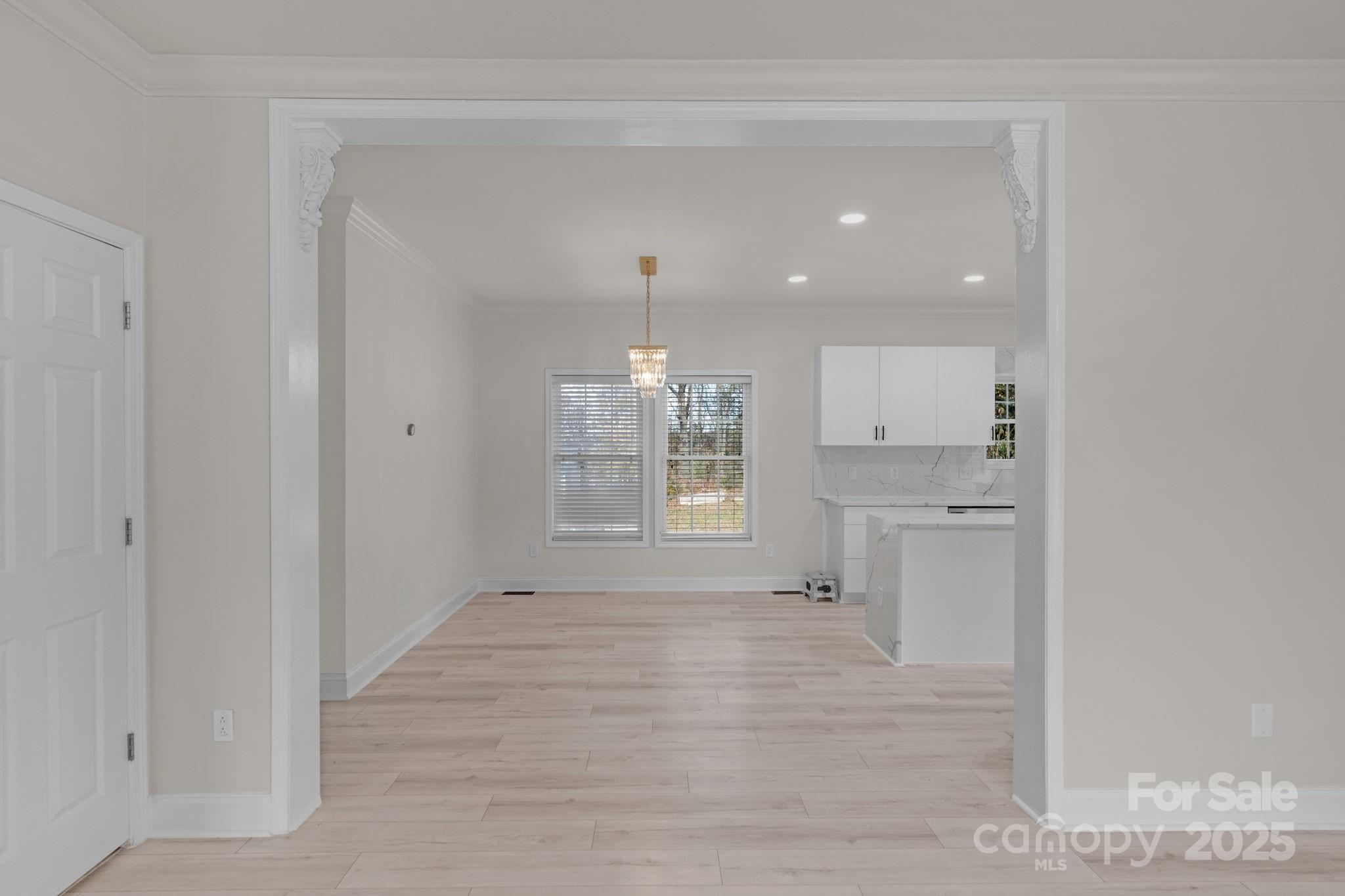 8891 Rock Hole Road Stanfield, NC 28163 - Photo 10 of 35 a view of an empty room and window