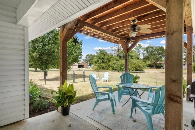 a view of an outdoor space with furniture
