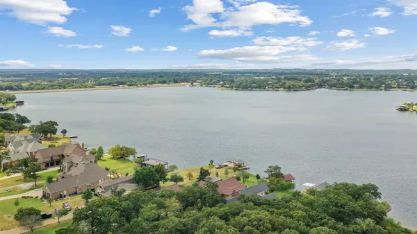 a view of a lake with a city