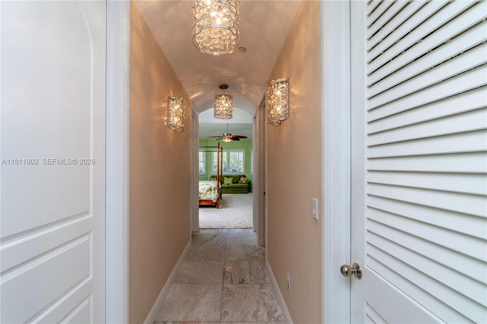37511 Washington Loop Road Punta Gorda, FL 33982 - Photo 32 of 50 Hall up stairs from Master bedroom to master bath