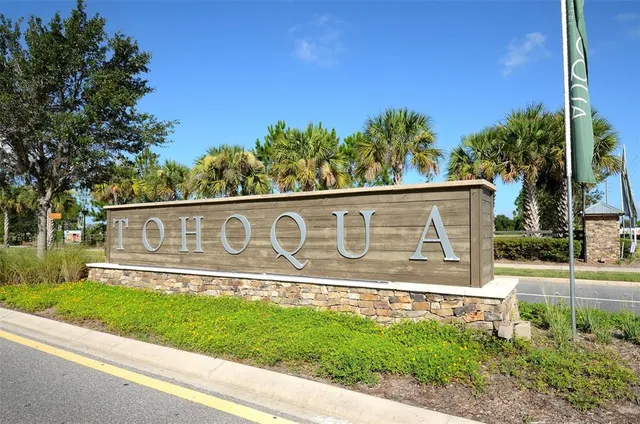 a street sign on the side of a building