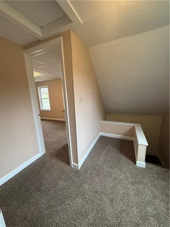 a view of a room with an empty space