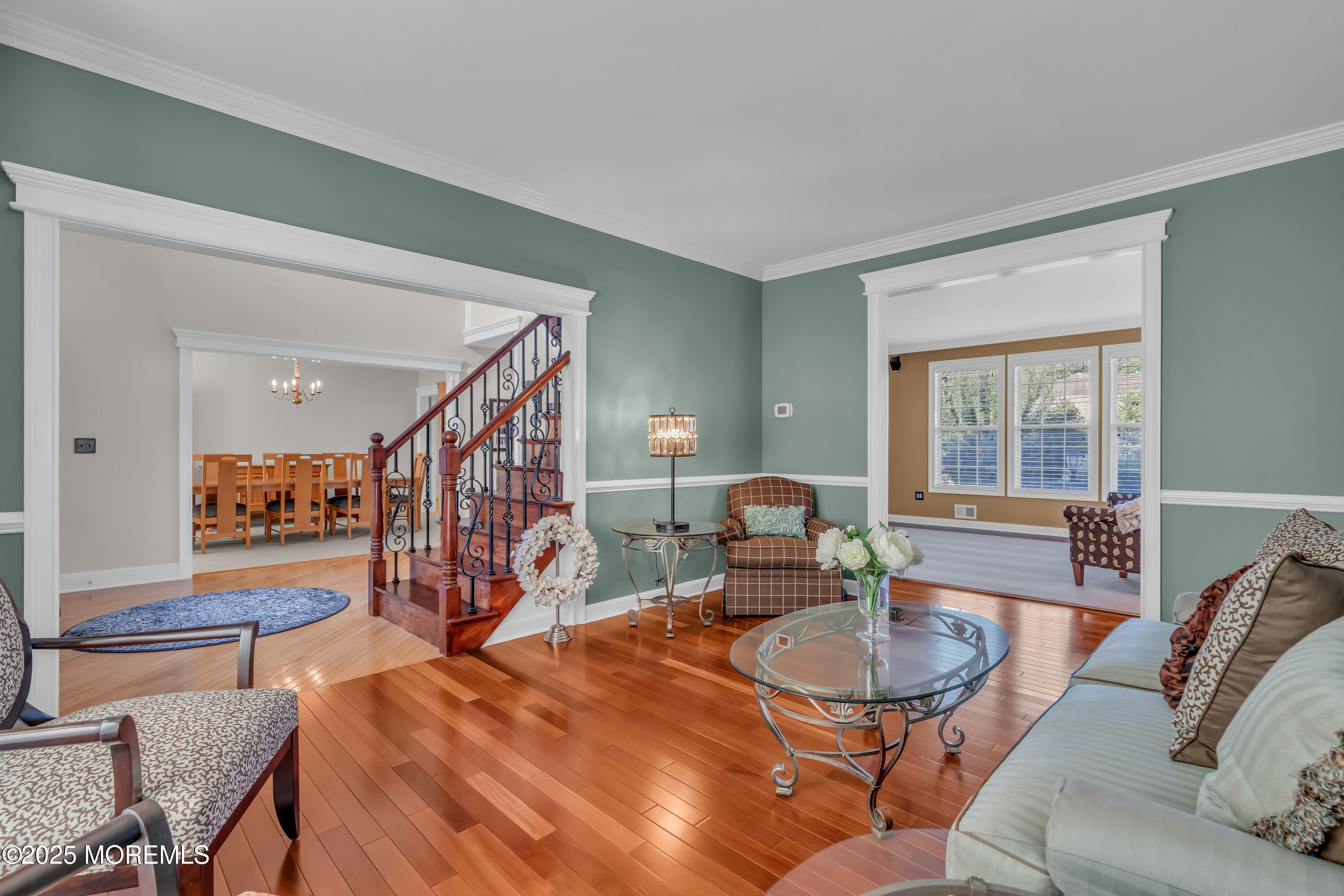67 Picadilly Drive Jackson, NJ 08527 - Photo 11 of 49 a living room with patio furniture and a wooden floor