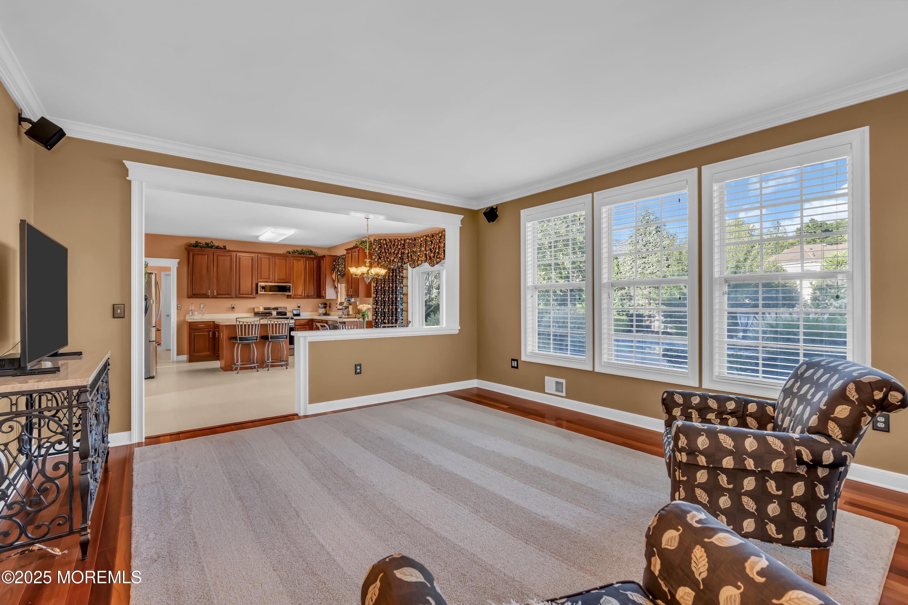 67 Picadilly Drive Jackson, NJ 08527 - Photo 15 of 49 a living room with furniture and a flat screen tv