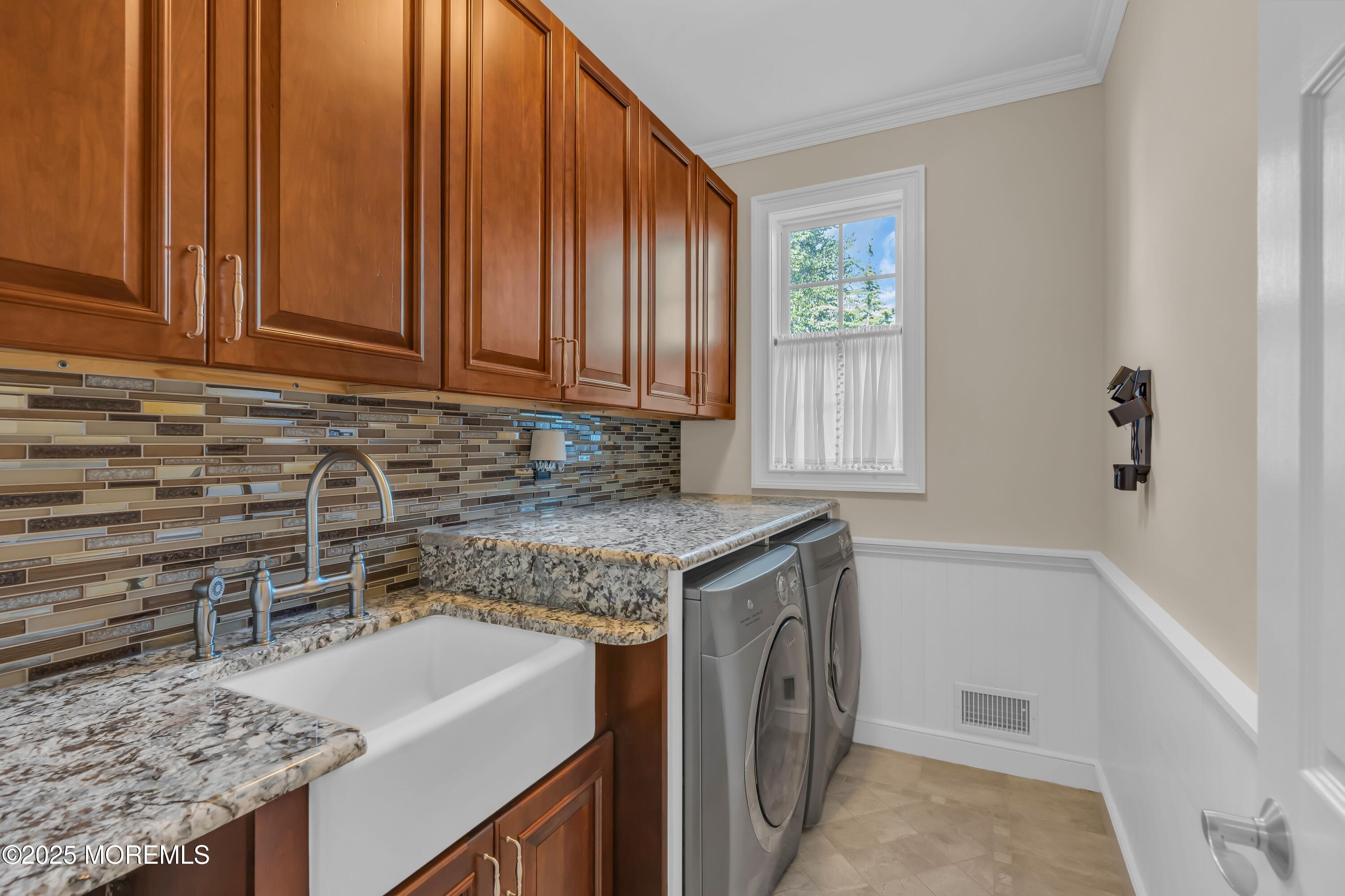 67 Picadilly Drive Jackson, NJ 08527 - Photo 22 of 49 a kitchen with a sink stove and cabinets