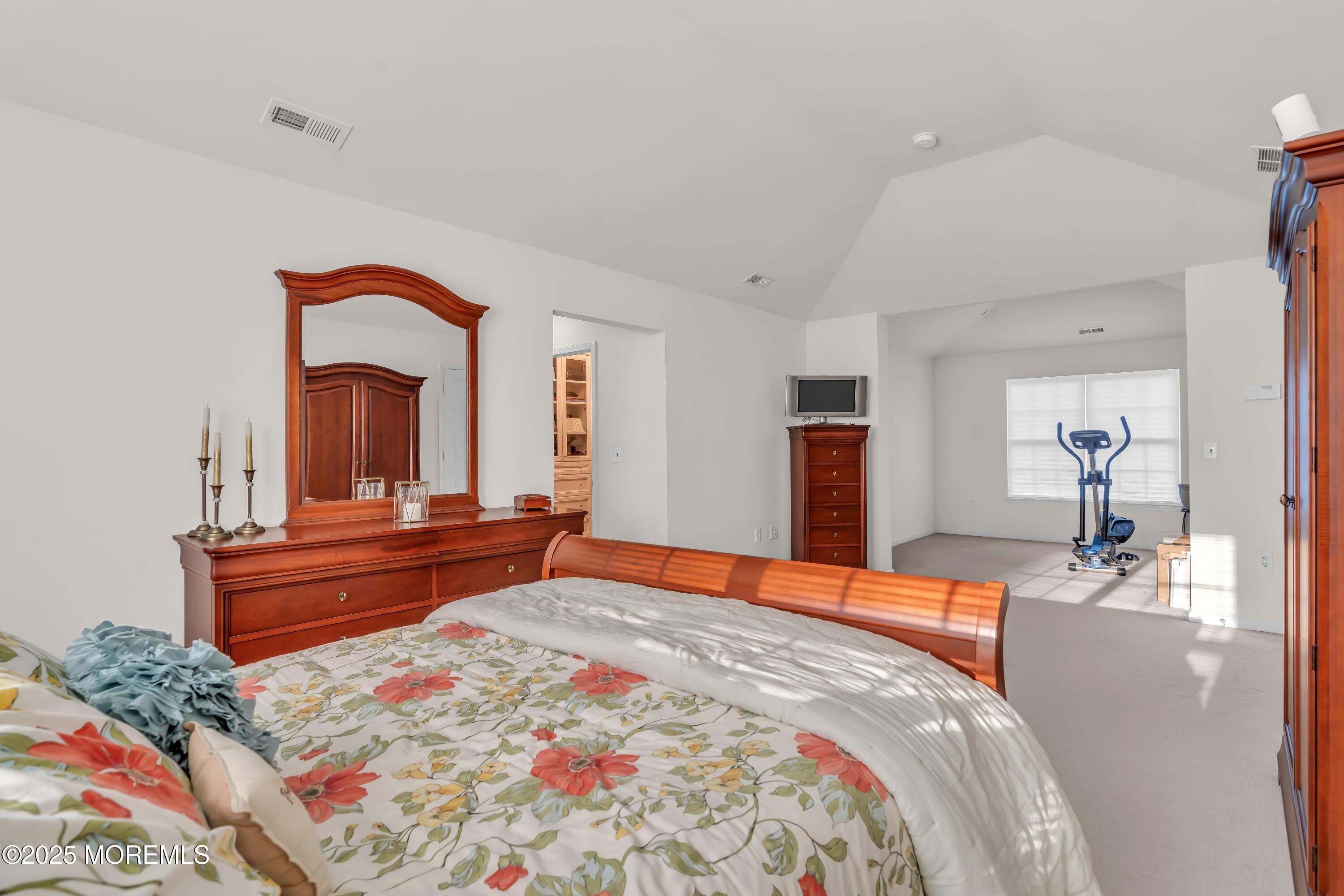 67 Picadilly Drive Jackson, NJ 08527 - Photo 24 of 49 a bedroom with a bed and a dresser