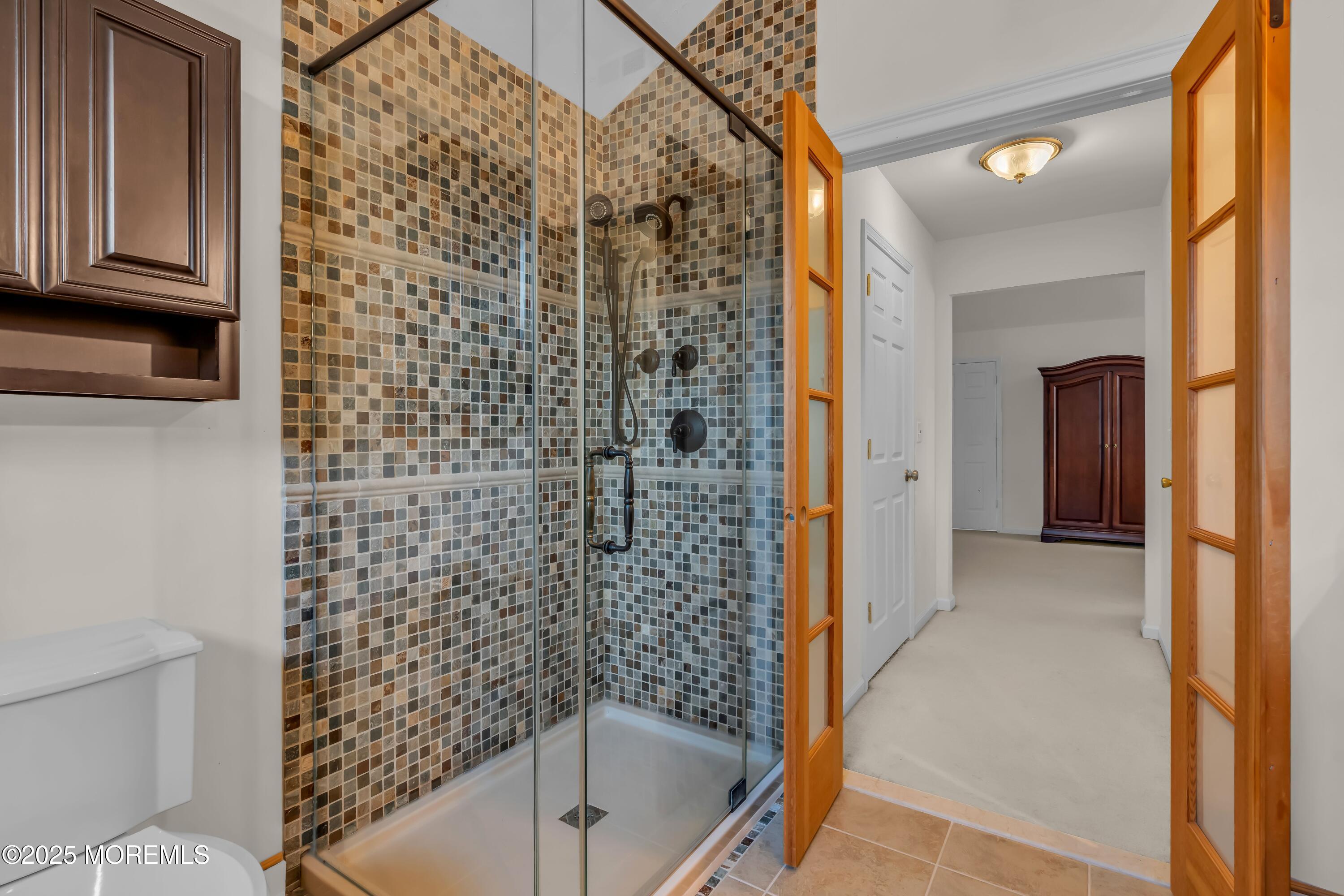 67 Picadilly Drive Jackson, NJ 08527 - Photo 28 of 49 a bathroom with a shower and a toilet