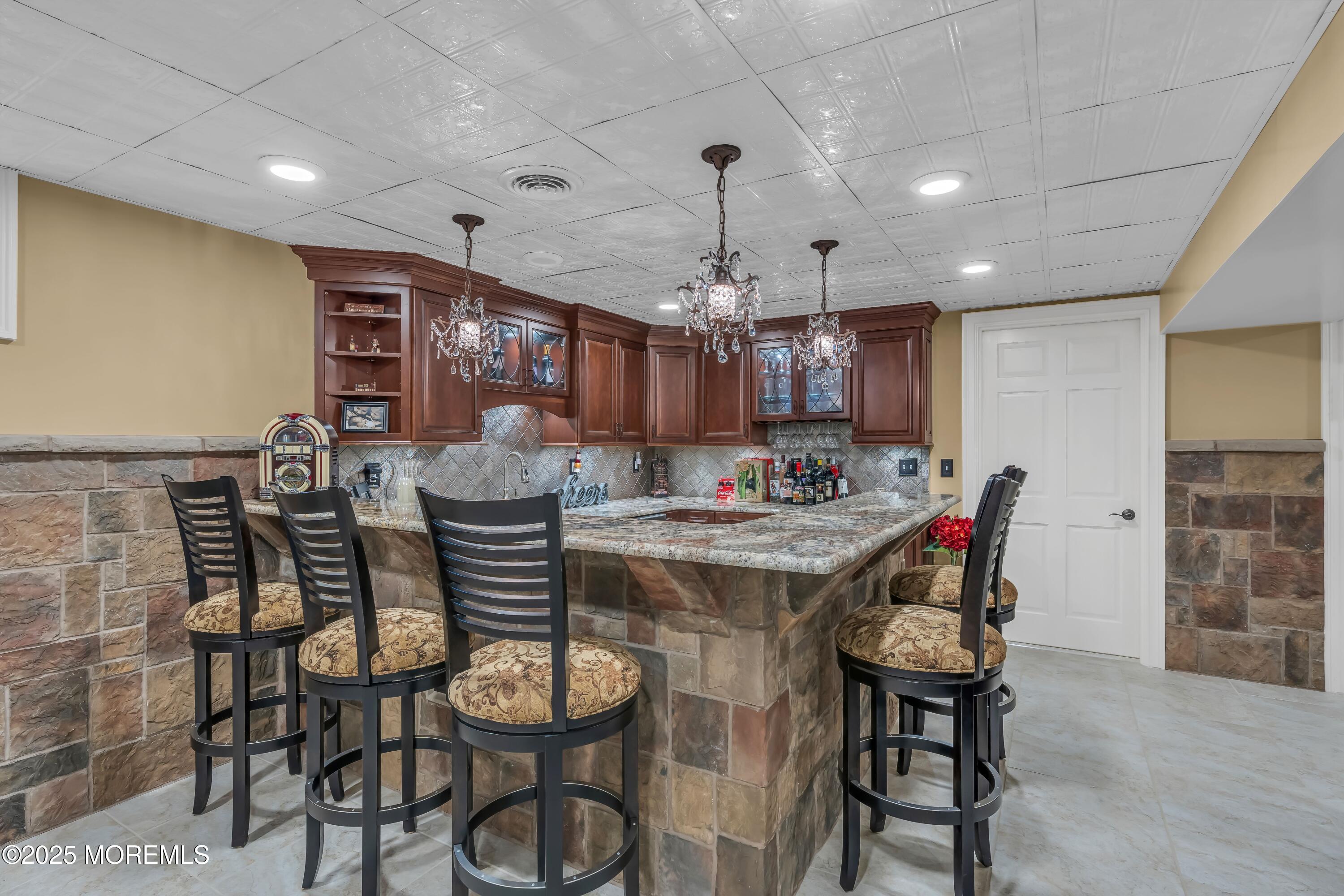 67 Picadilly Drive Jackson, NJ 08527 - Photo 38 of 49 a view of a dining room with furniture