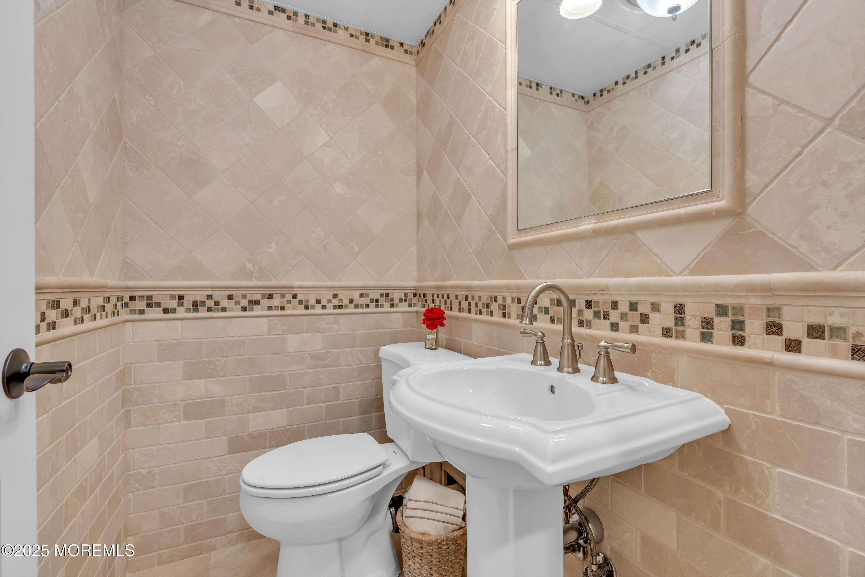 67 Picadilly Drive Jackson, NJ 08527 - Photo 39 of 49 a bathroom with a sink a toilet and mirror