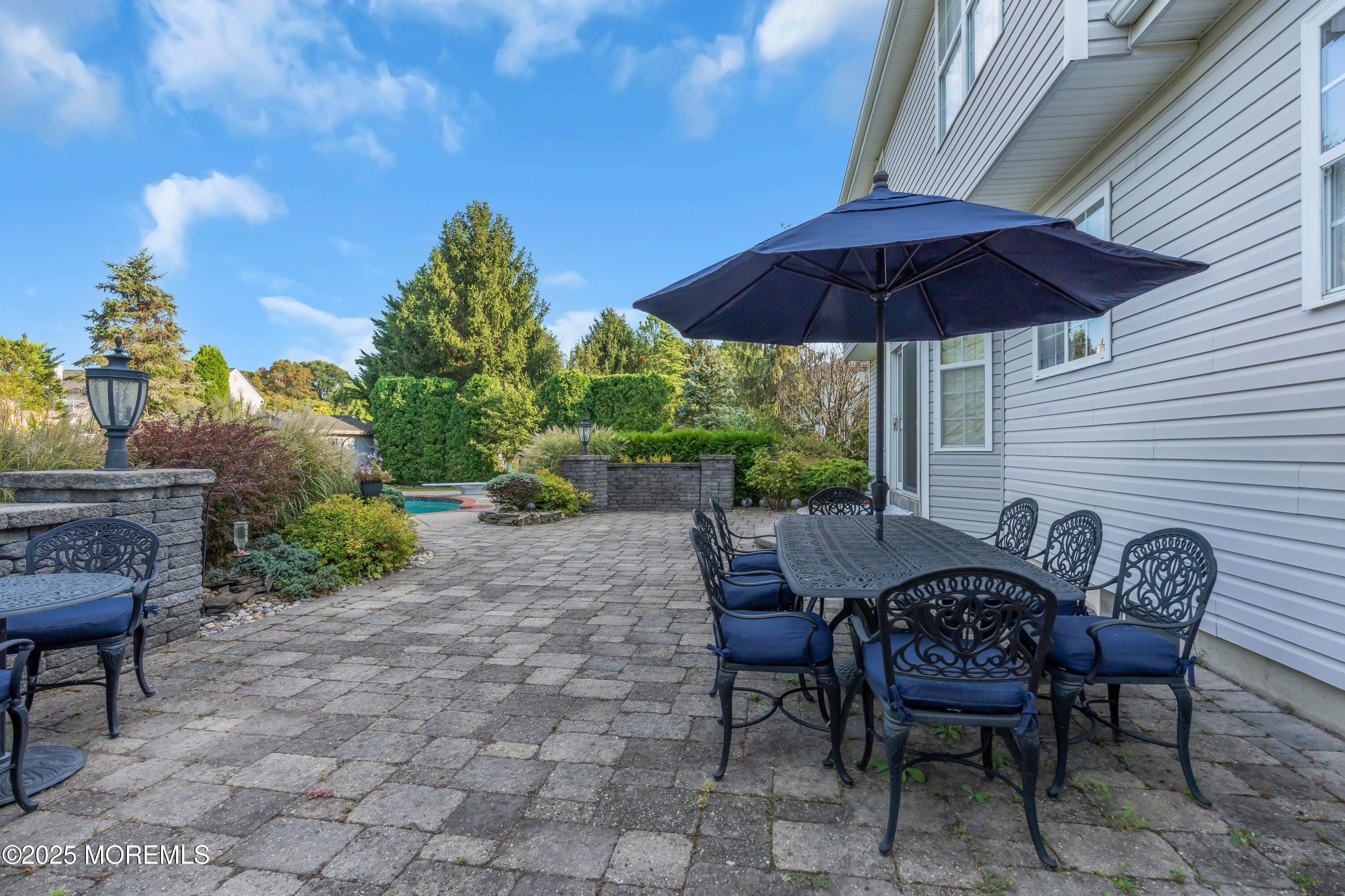 67 Picadilly Drive Jackson, NJ 08527 - Photo 41 of 49 a view of backyard with seating space and wooden fence