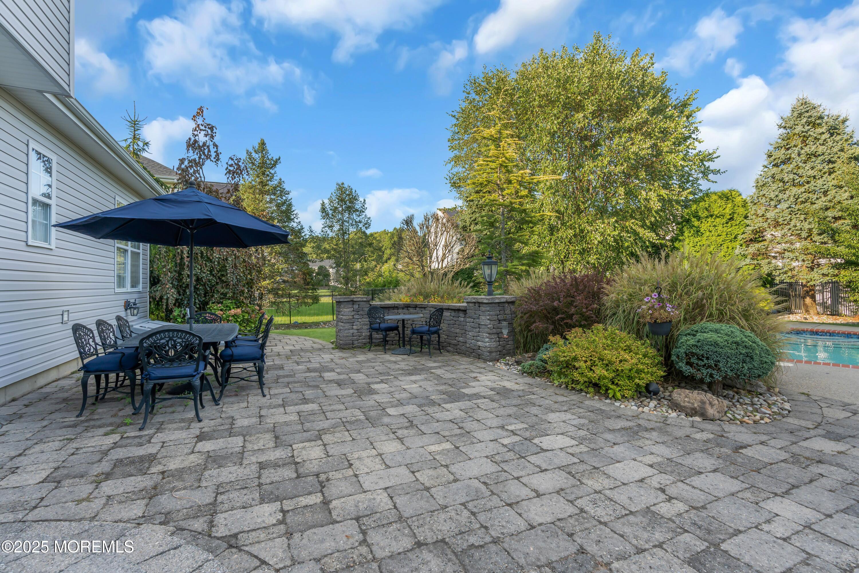 67 Picadilly Drive Jackson, NJ 08527 - Photo 43 of 49 a view of a patio with furniture and a backyard