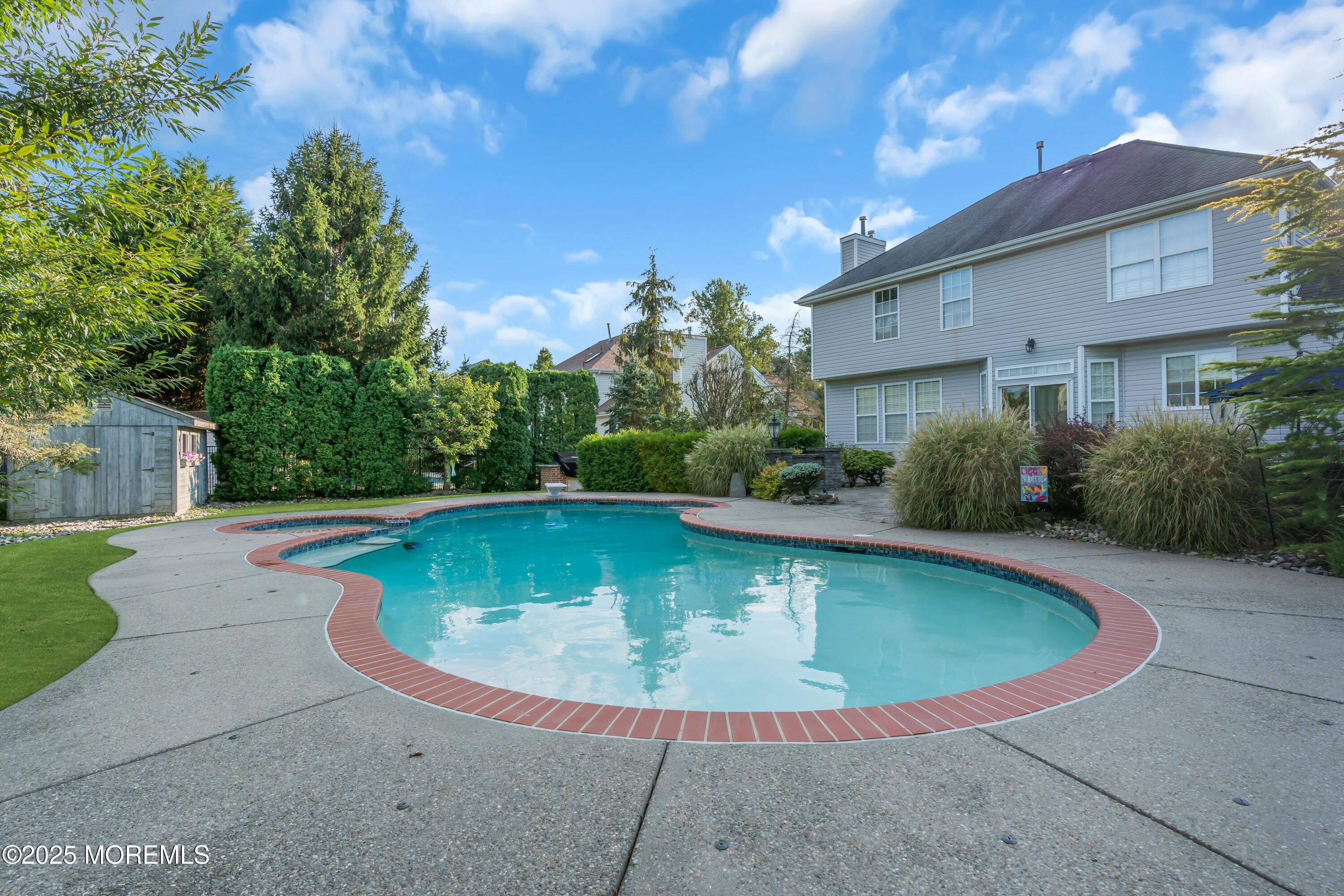 67 Picadilly Drive Jackson, NJ 08527 - Photo 46 of 49 a view of outdoor space yard swimming pool and patio