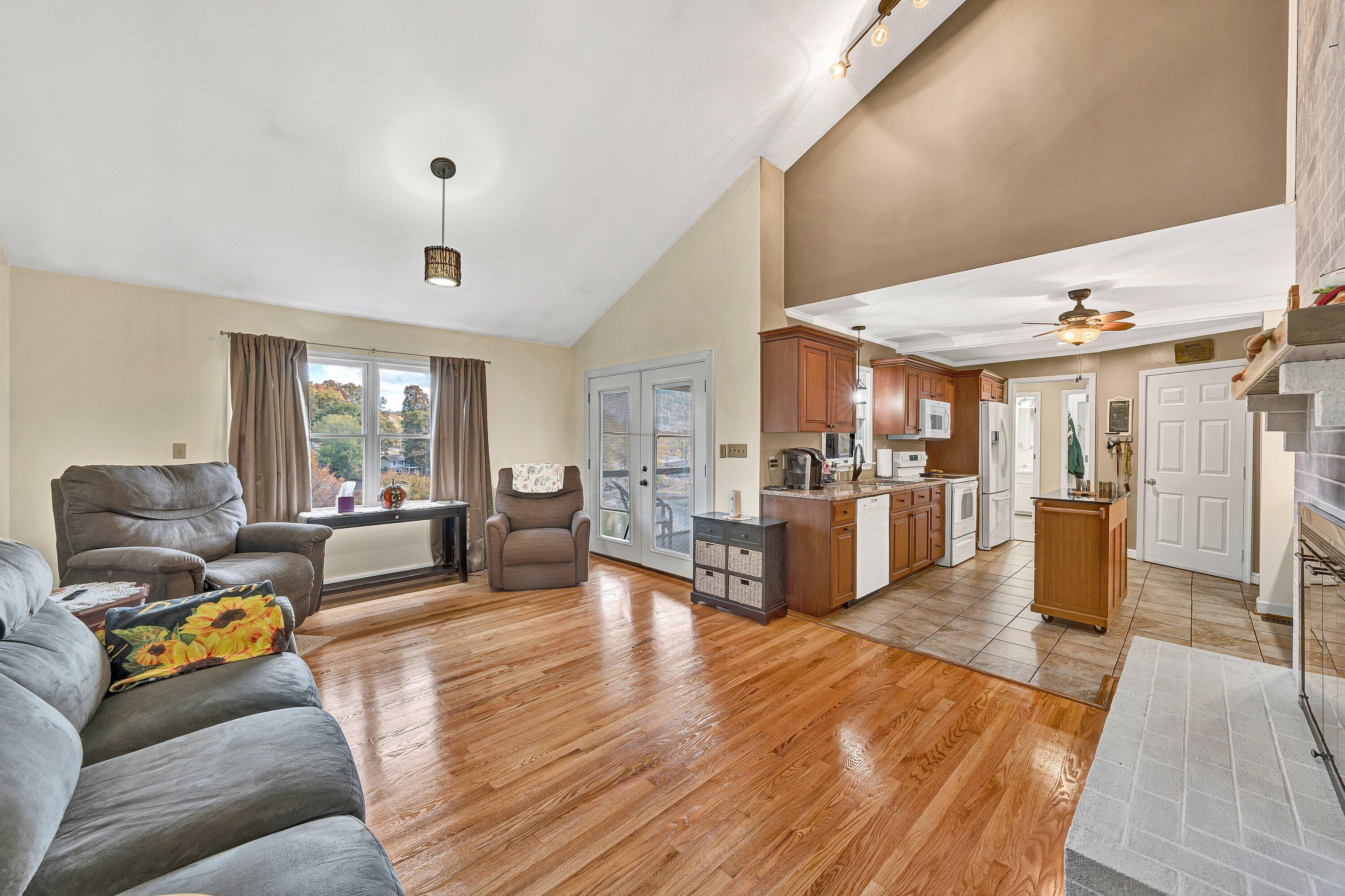 2228 Thomason Lane Goodview, VA 24095 - Photo 20 of 70 a living room with furniture and kitchen view