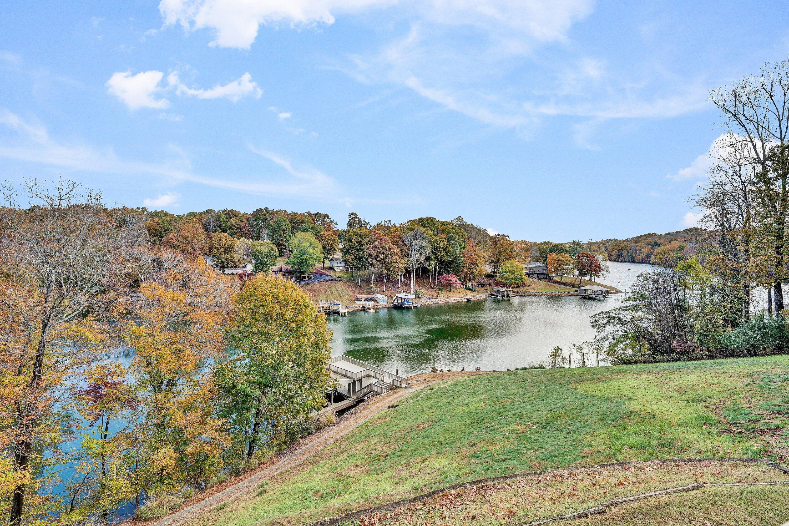 2228 Thomason Lane Goodview, VA 24095 - Photo 24 of 70 a view of a lake with houses in the back