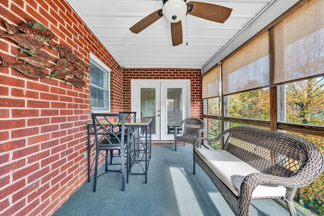 a bathroom with a toilet sink shower