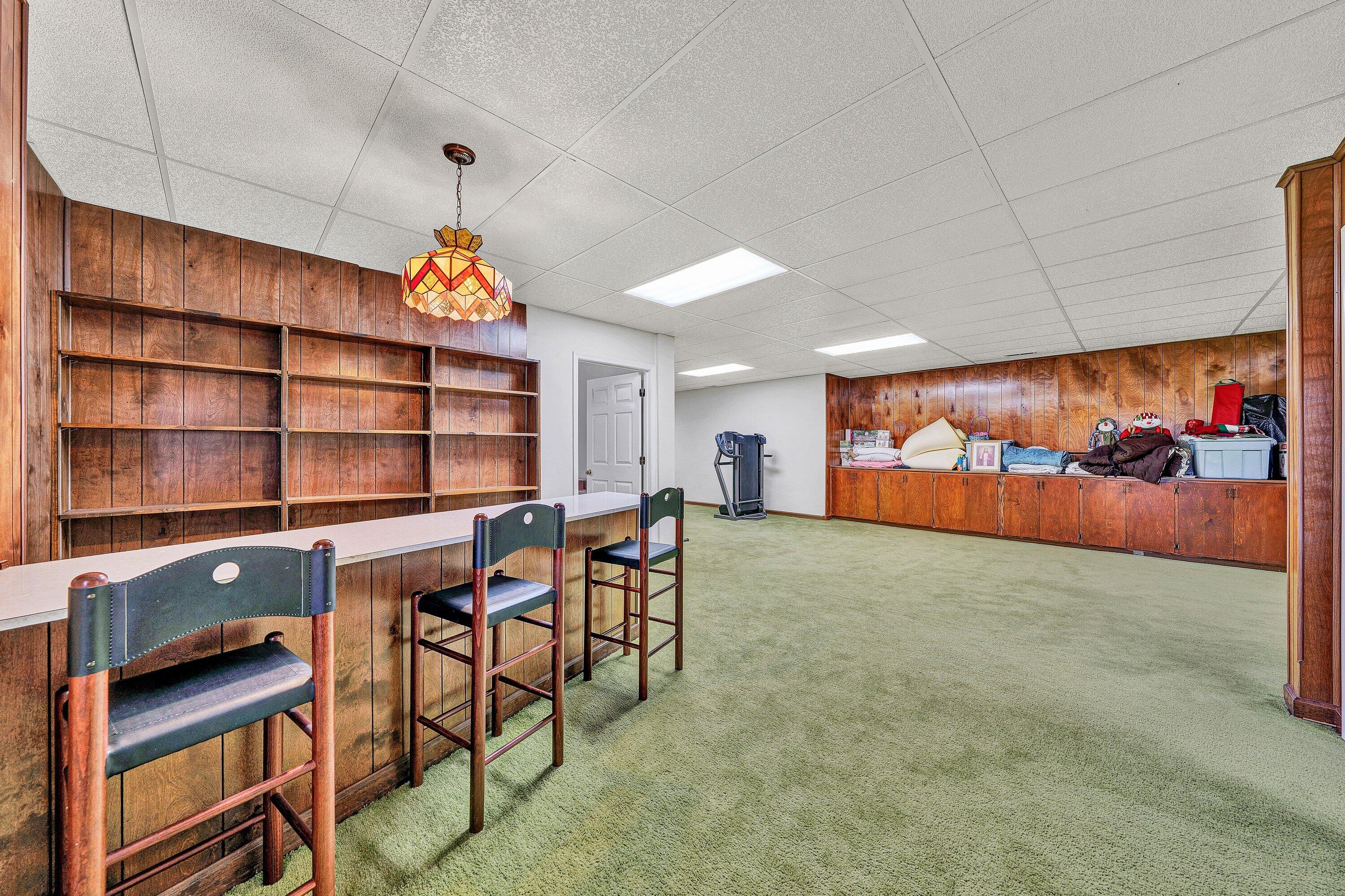 2228 Thomason Lane Goodview, VA 24095 - Photo 37 of 70 a view of a room with shelves