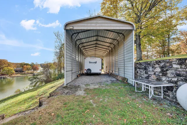 a view of a car park in front of house