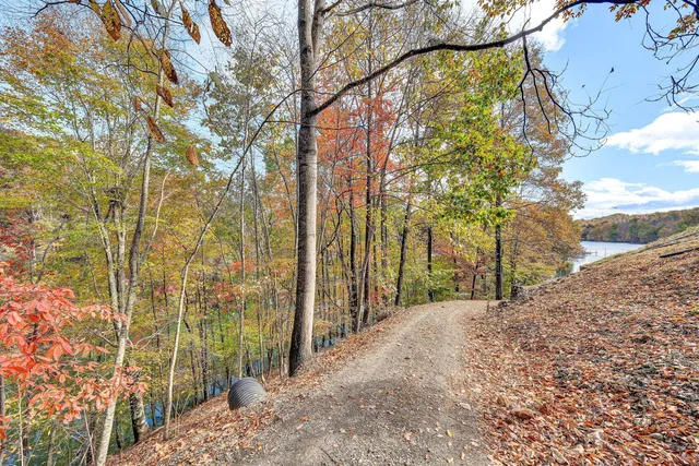 a view of a lake from a balcony