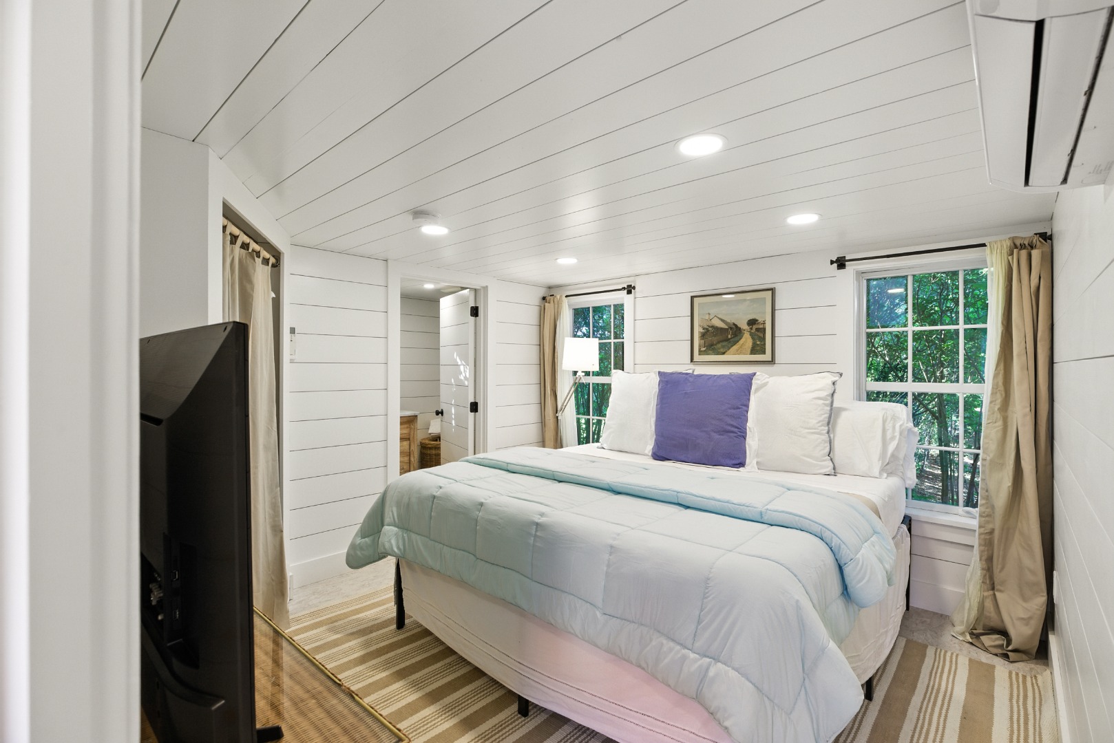 17 New Street Nantucket, MA 02554 - Photo 11 of 31 a bedroom with a large bed and a dresser