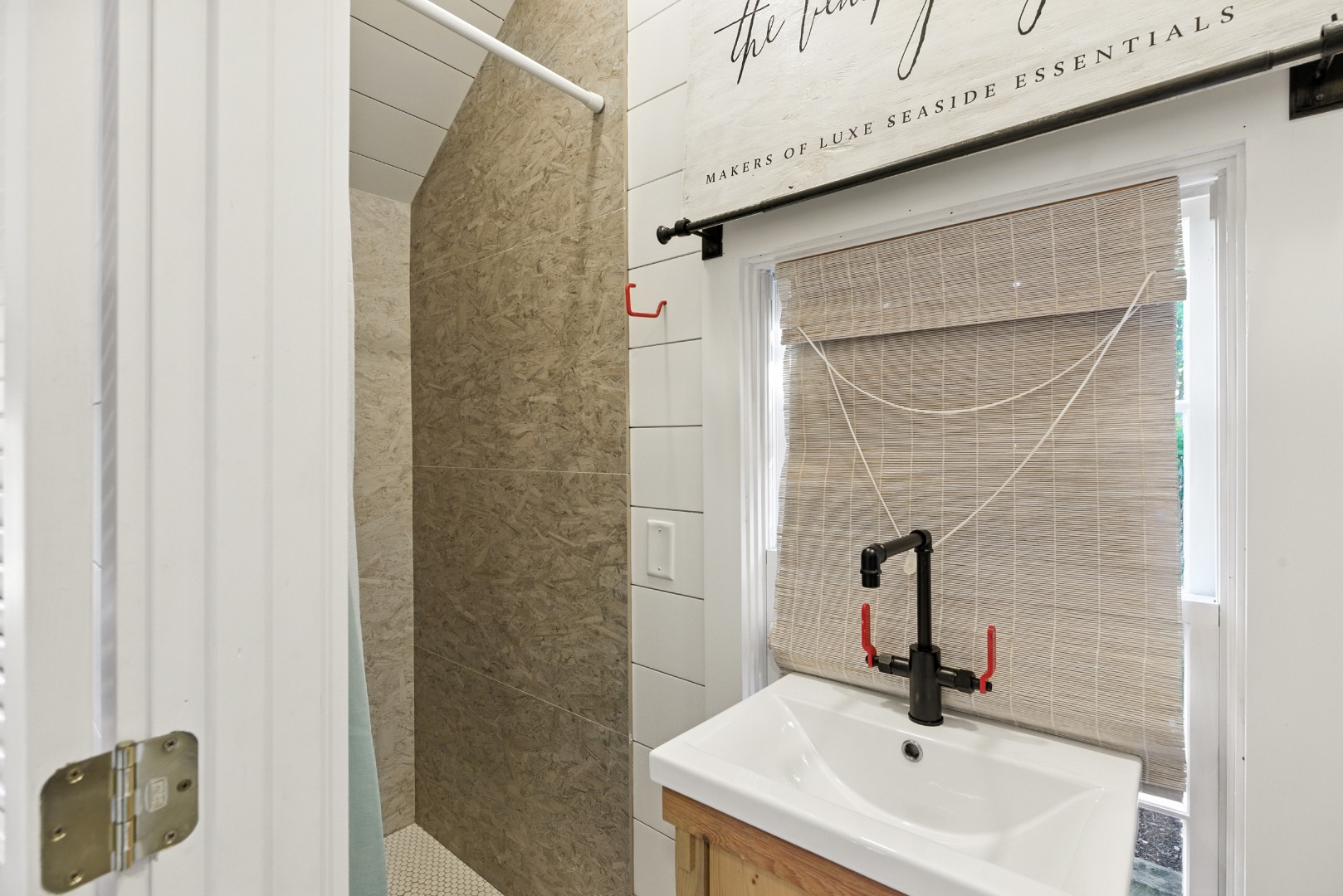 17 New Street Nantucket, MA 02554 - Photo 12 of 31 a bathroom with a sink and mirror