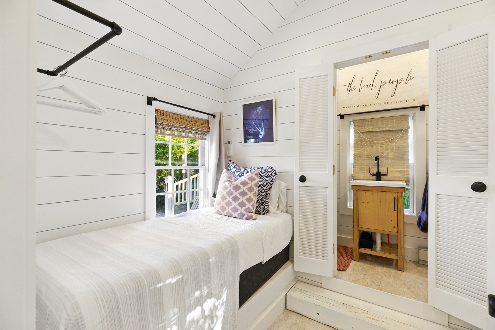 17 New Street Nantucket, MA 02554 - Photo 13 of 31 a bedroom with a bed and a mirror