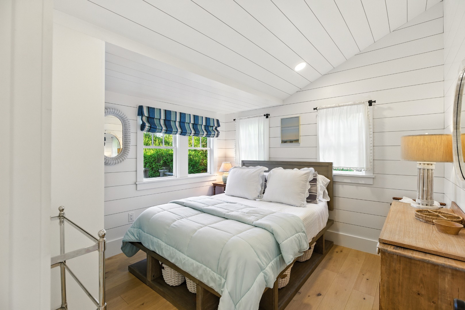 17 New Street Nantucket, MA 02554 - Photo 26 of 31 a bedroom with a bed and a window