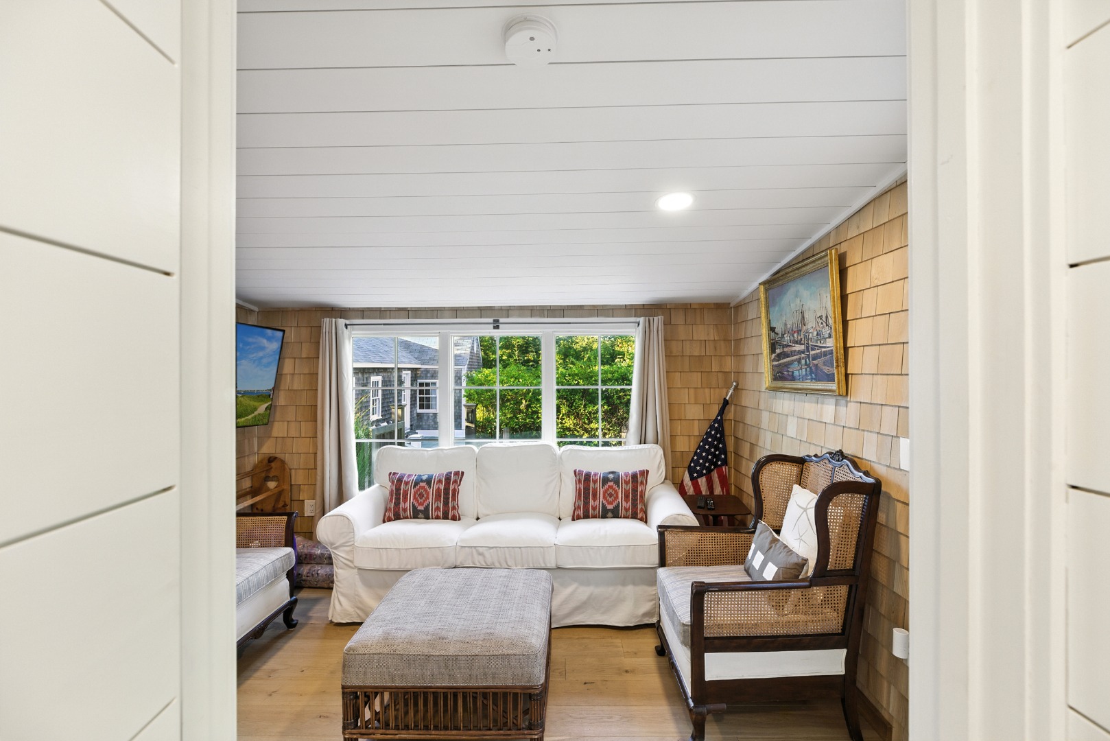 17 New Street Nantucket, MA 02554 - Photo 28 of 31 a living room with furniture and a large window