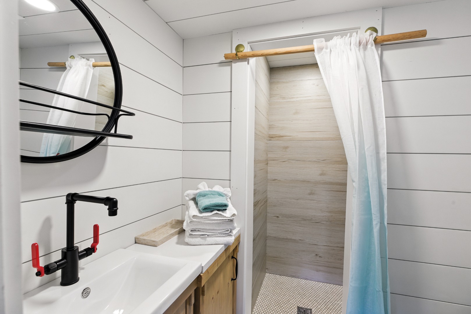 17 New Street Nantucket, MA 02554 - Photo 29 of 31 a bathroom with a sink and shower