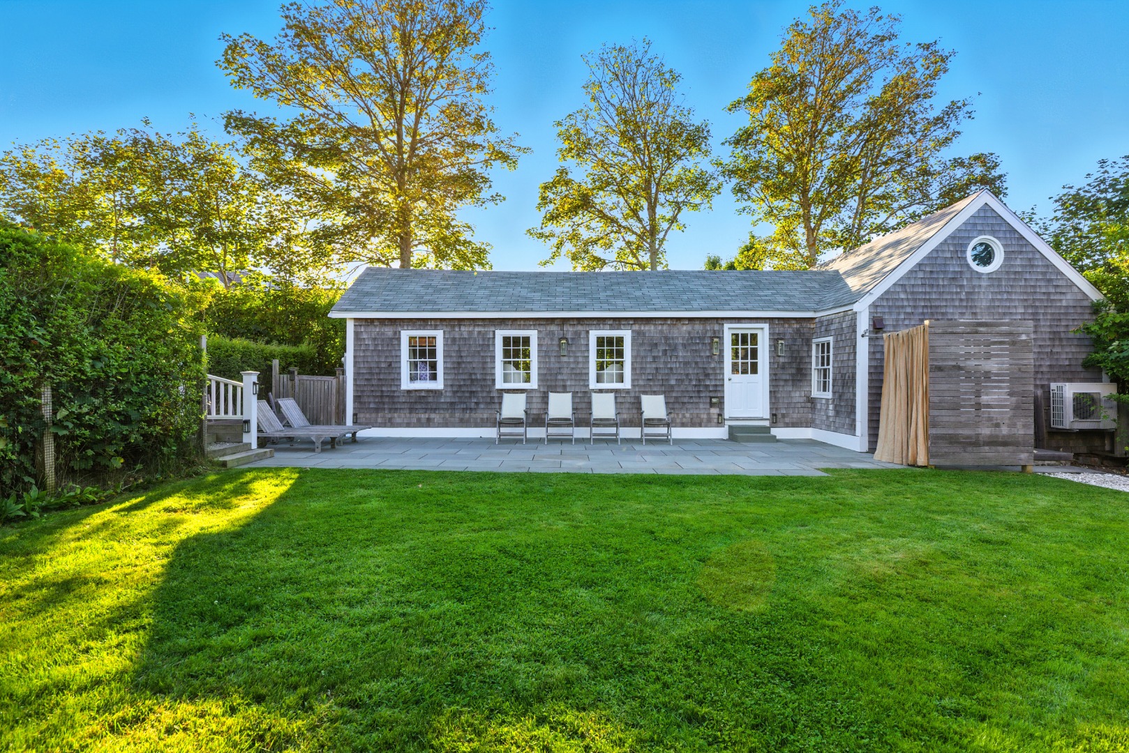 17 New Street Nantucket, MA 02554 - Photo 30 of 31 a front view of a house with yard patio and swimming pool