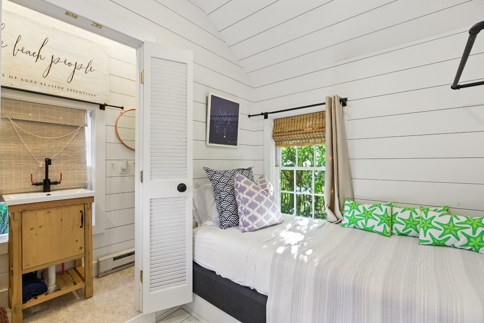 17 New Street Nantucket, MA 02554 - Photo 10 of 31 a bedroom with a bed window and a flat tv screen