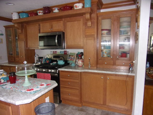249 Van Road Cranberry, PA 16319 - Photo 29 of 46 a kitchen with a sink stove and microwave