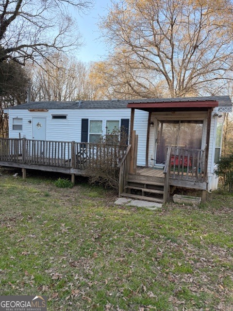 2693 Dempsey Brown Road Dewy Rose, GA 30634 - Photo 11 of 28 a view of a house with a yard