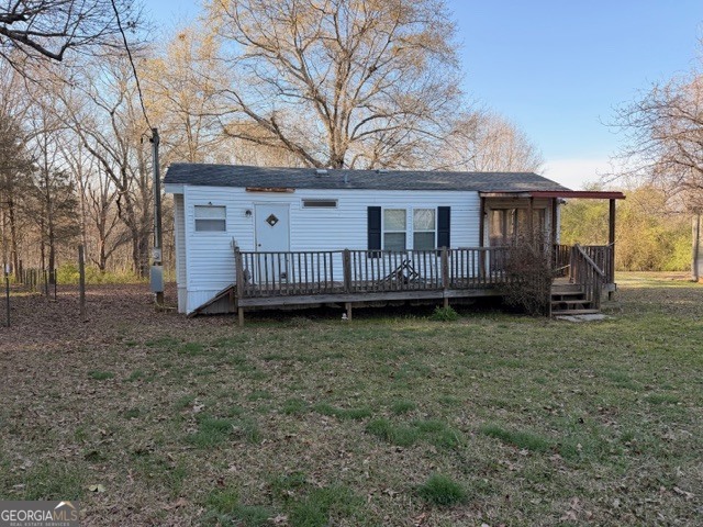 2693 Dempsey Brown Road Dewy Rose, GA 30634 - Photo 12 of 28 a view of a house with a yard