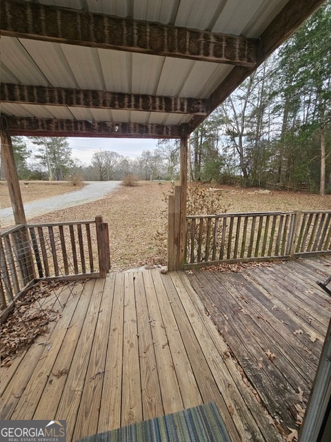 2693 Dempsey Brown Road Dewy Rose, GA 30634 - Photo 22 of 28 a view of wooden deck
