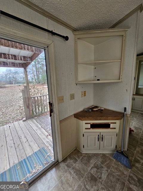 2693 Dempsey Brown Road Dewy Rose, GA 30634 - Photo 28 of 28 a room with a stove and a cabinet