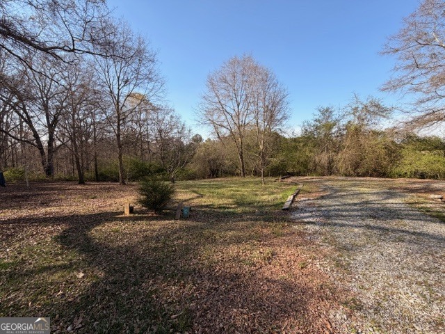 2693 Dempsey Brown Road Dewy Rose, GA 30634 - Photo 5 of 28 a view of outdoor space with yard