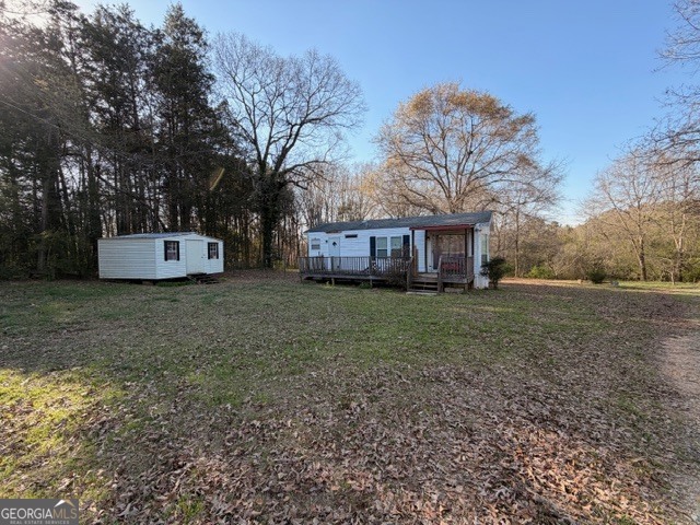 2693 Dempsey Brown Road Dewy Rose, GA 30634 - Photo 7 of 28 a view of a house with a yard