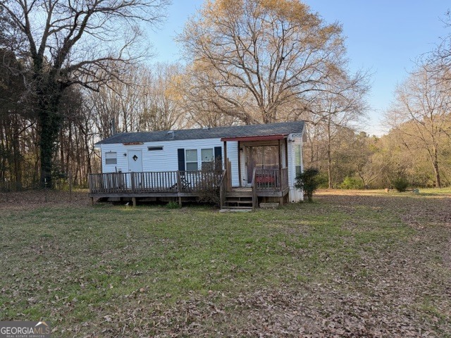 2693 Dempsey Brown Road Dewy Rose, GA 30634 - Photo 8 of 28 a view of a house with a yard